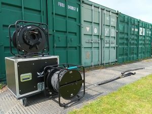 Fibre reels infront of container
