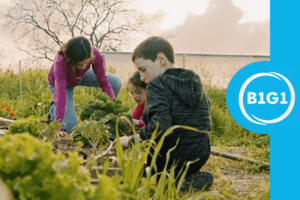 B1G1 donation - kids planting vegetables in the farm