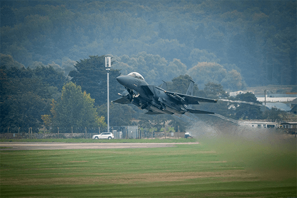 RAF Fighter Jet taking off from airport runway. Photo credit: Jonny Gios, Unsplash
