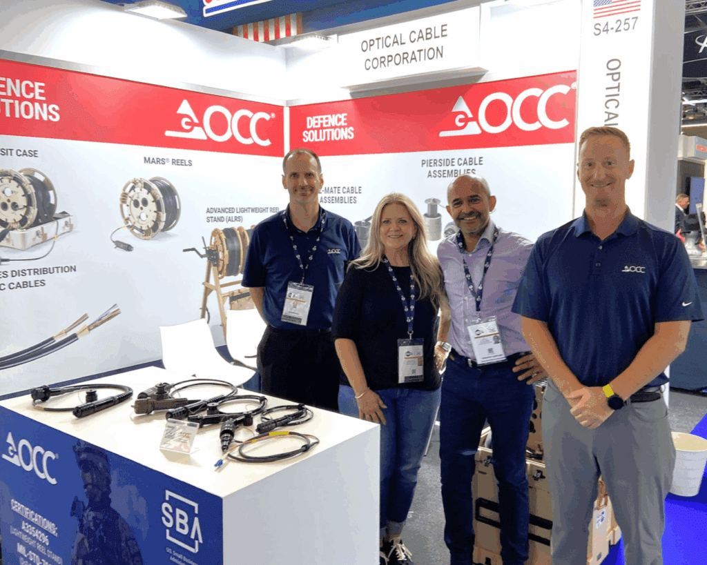 People at stand at DSEI 2025