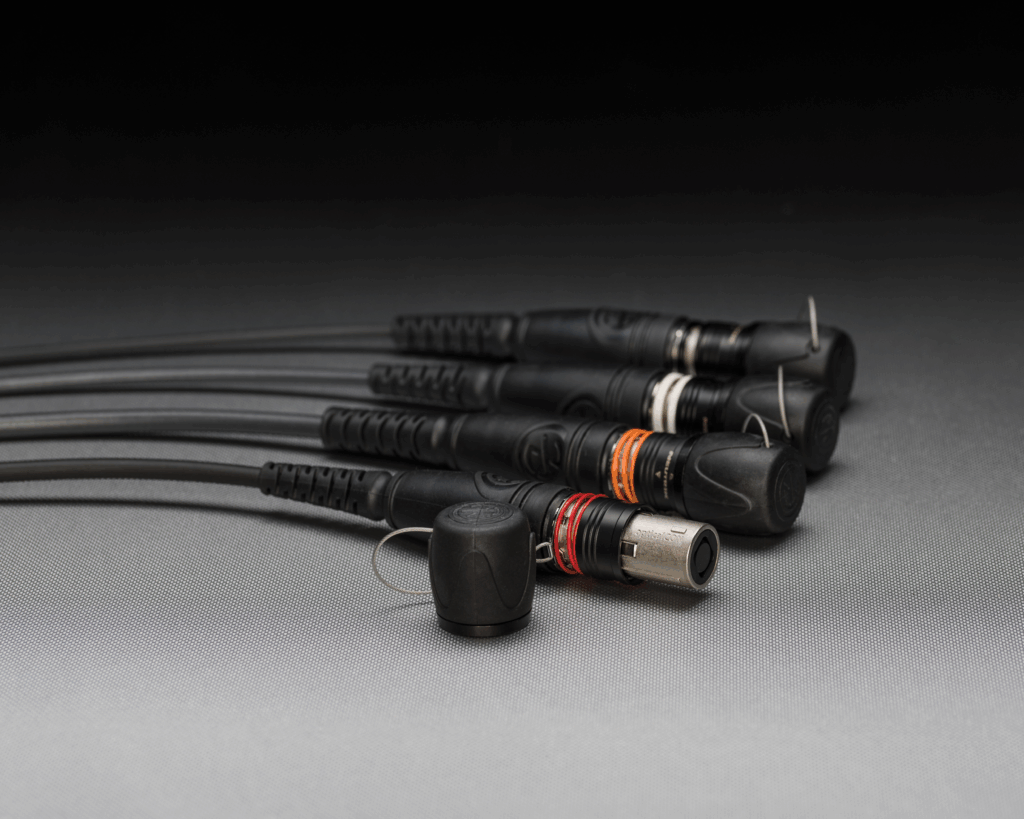 Neutrik connectors lined up in a row