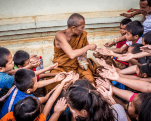 Person handing out food for charity