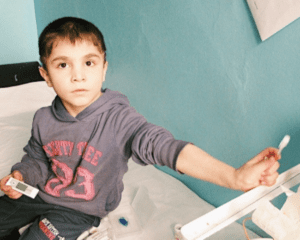 Boy receiving medical support