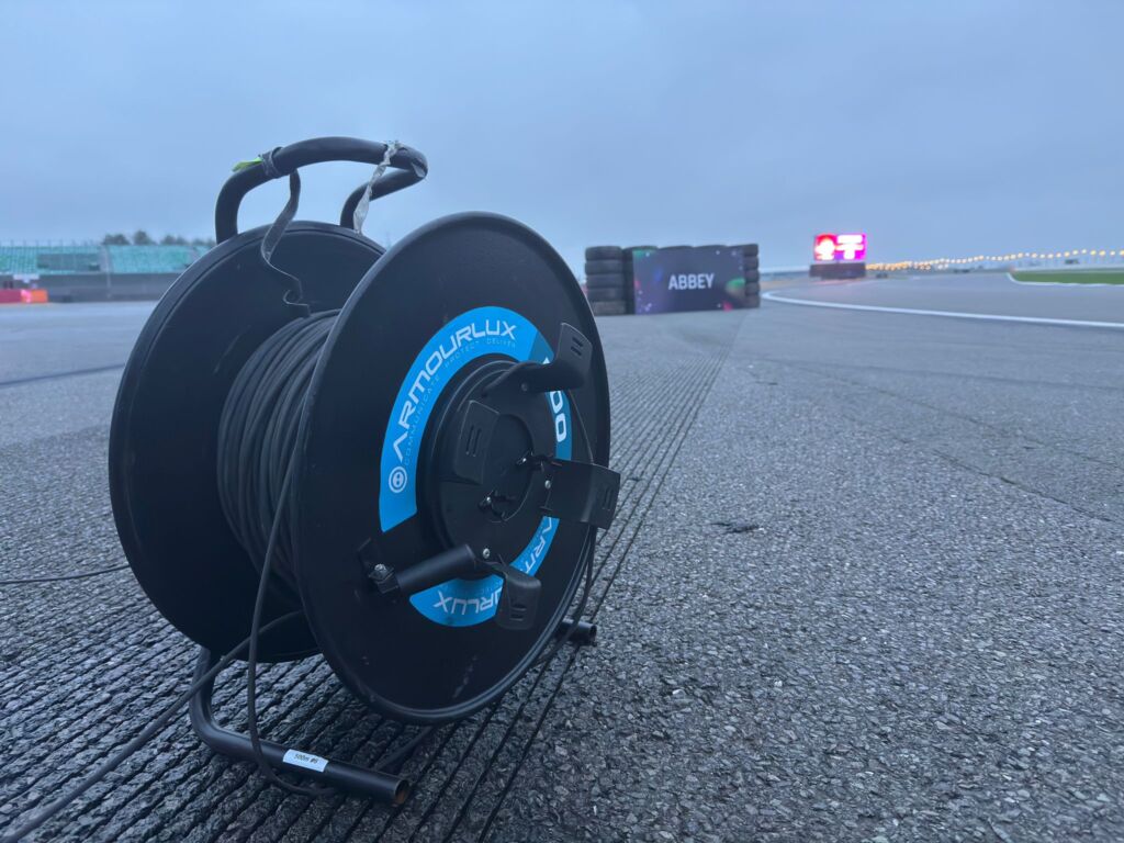 Fibre reel on side of racetrack