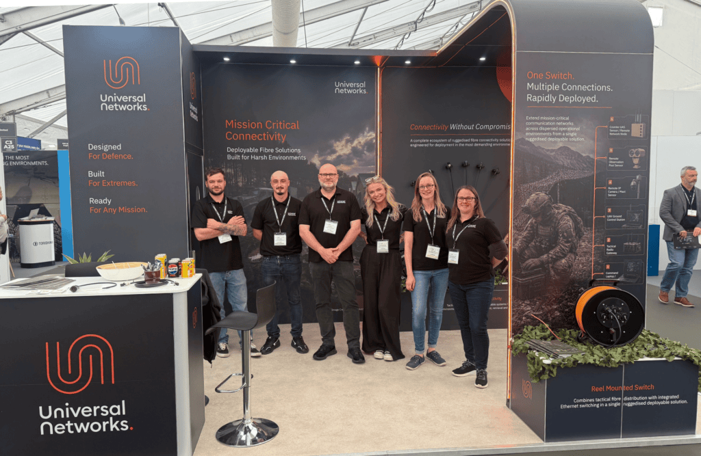 people on exhibition stand